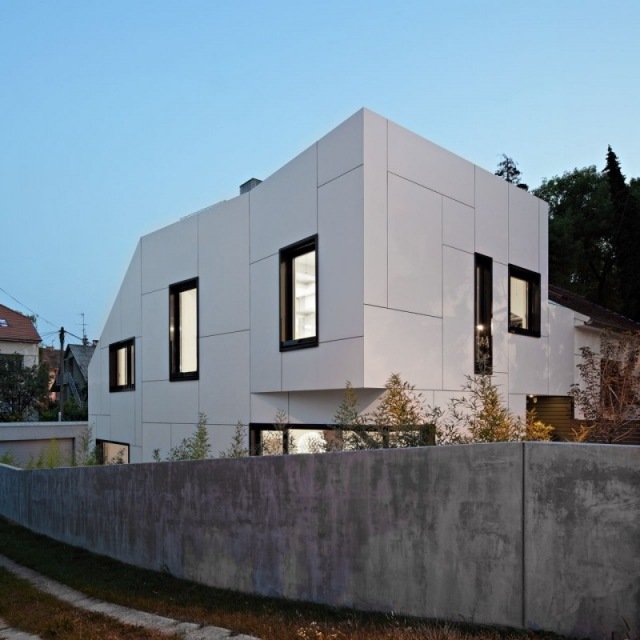 a-ett hus asymmetrisk-lekfull form radhus moderna