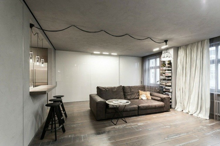 möblering 1 rums lägenhet soffa brun laminat skiljevägg vit