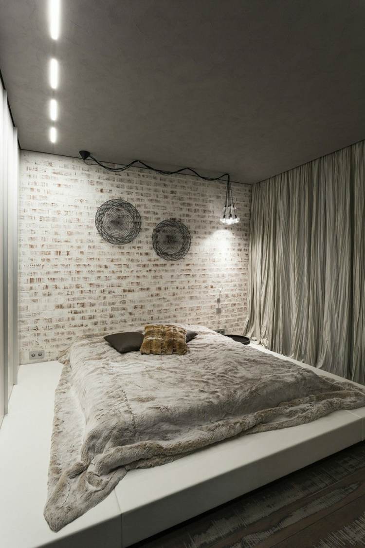 möblera 1 rums lägenhet sovrum piedestal vit tegel vägg loft stil