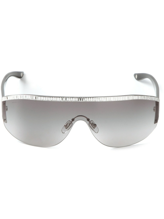 Silverfärgade-solglasögon-rak-form-med-rad-av-glitter-element-VERSACE