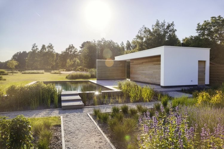 idéer-trädgårdsdesign-modern-romantisk-design-grusvägar-rabatter-buskar