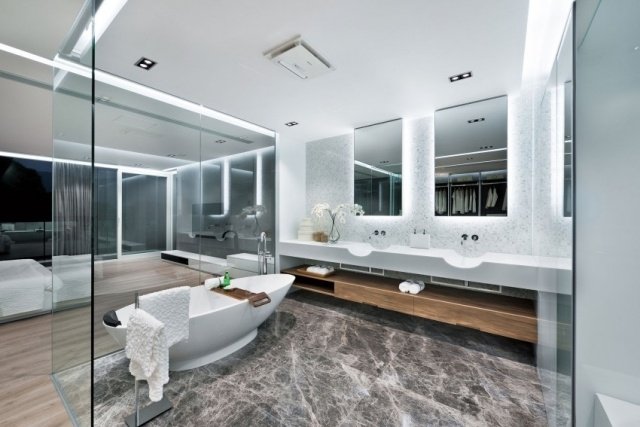 barriärfritt badrum-natursten-golv-kakel-glas-väggar-upphängd-tak-integrerad-ljus