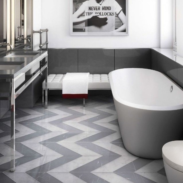 Golvplattor-vinkelmönster-grå-vit-badrum-design-möblering-trendig
