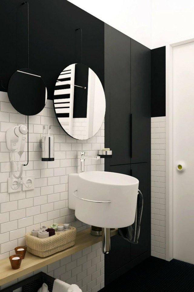 badrum-vägghängd-handfat-oval-svart-vit-kontraster