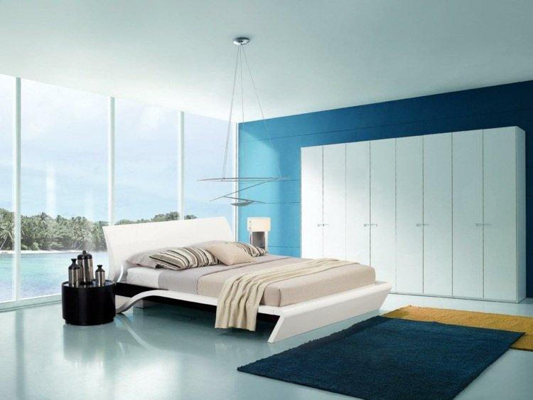 levande idéer för sovrumsvägg ljusblå vita möbler sidobordsmatta