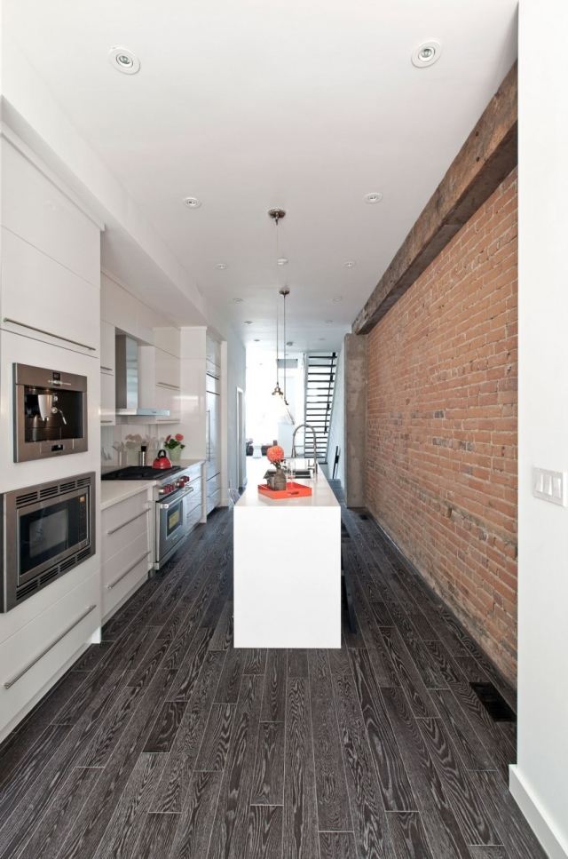 Köksblock design modern vit köksö laminat svart vägg tegelvägg