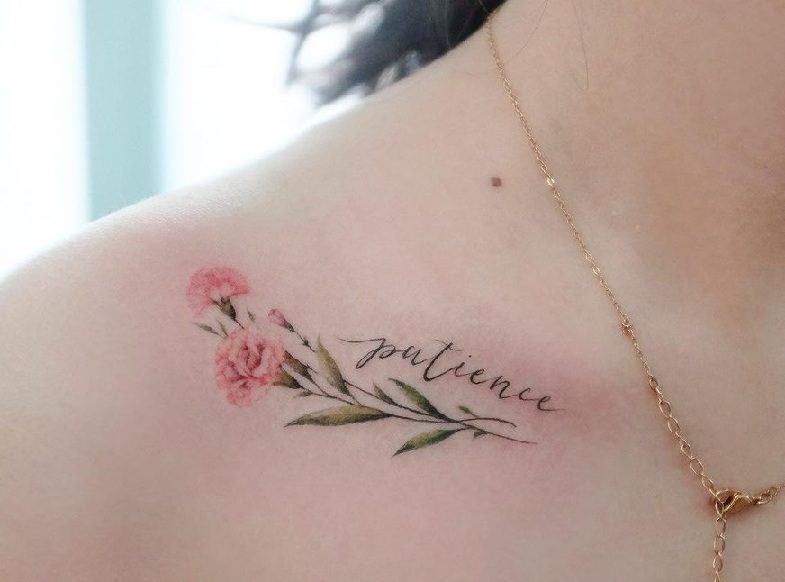 Flower Tattoo Near The Collar Bone