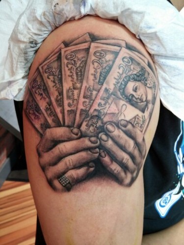 raha merkki tatuointi