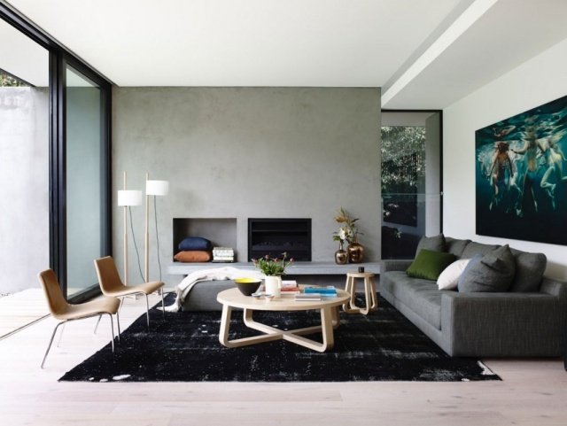 Trender i vardagsrumsdesign med färg-svart matta djupa pålbord i trä