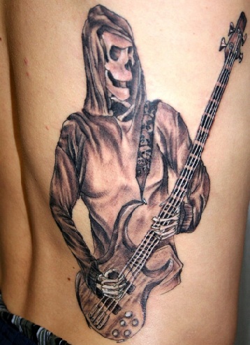 Rock Star Skeleton με Guitar Tattoo