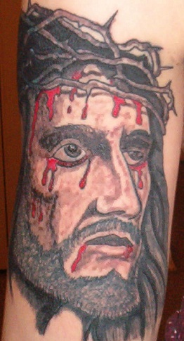 Τατουάζ του Ιησού στο αντιβράχιο