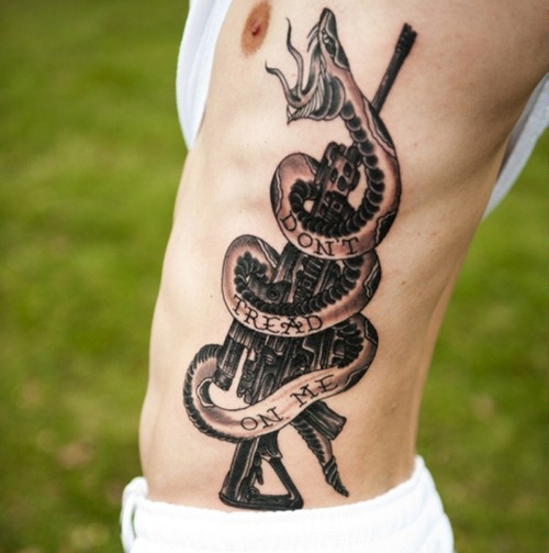 Gun and Snake Tattoo Design on Side for Men