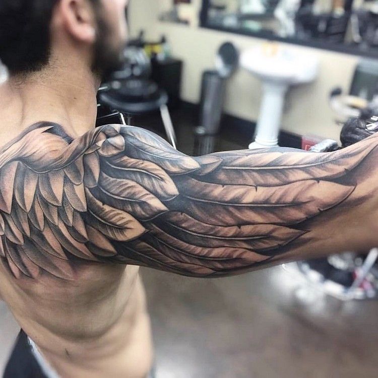 vinge tatuering arm tillbaka män tatueringar design idéer