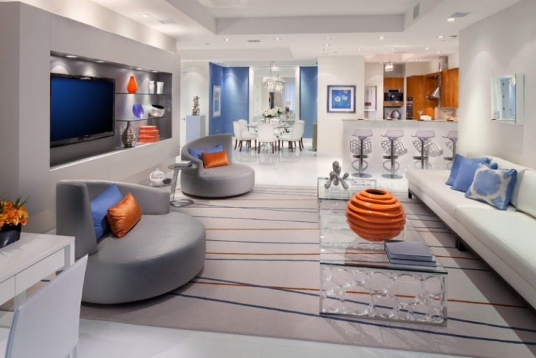 vardagsrum-modern-design-futuristiska-möbler-design-språk-orange-färg accenter