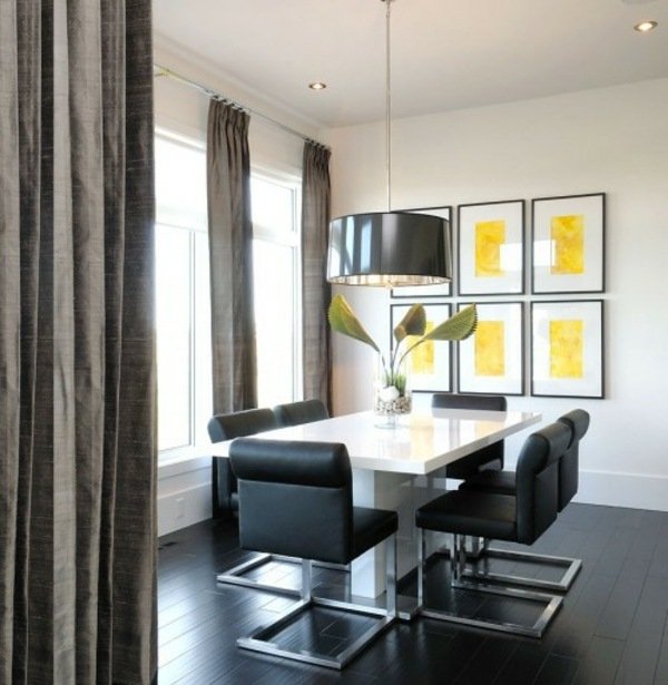 svart-fribärande-stolar-matsal-gul-vägg-dekoration