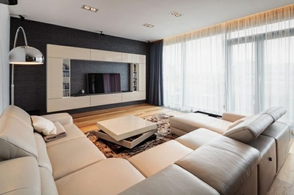 beige läder möbler grå vägg enhet TV