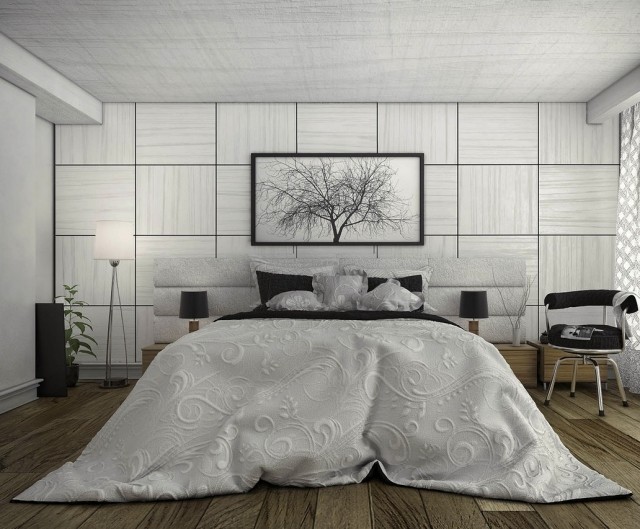 modern-sovrum-design-monokromatisk-grå-väggpaneler-deco-trä-golvbrädor-sängbord