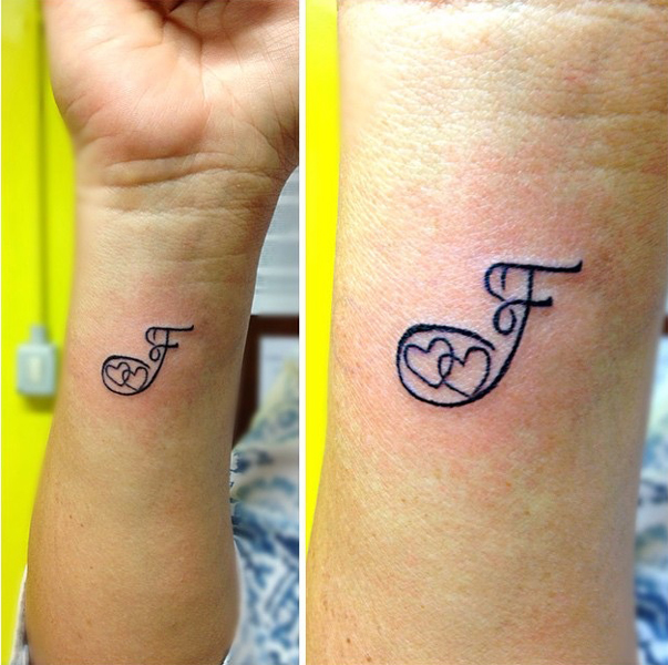 F Letter Tattoo With Dual Hearts