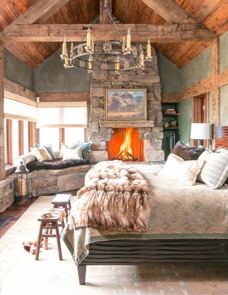 romantisk-sovrum-lantlig stil-chaler-natursten-eldstad-päls-täcke