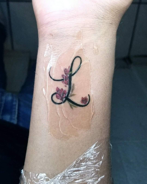 Kukkainen L Tattoo Merkitys