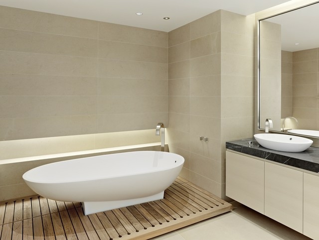 Golv fristående badkar badrumsmöbler kakel neutralt
