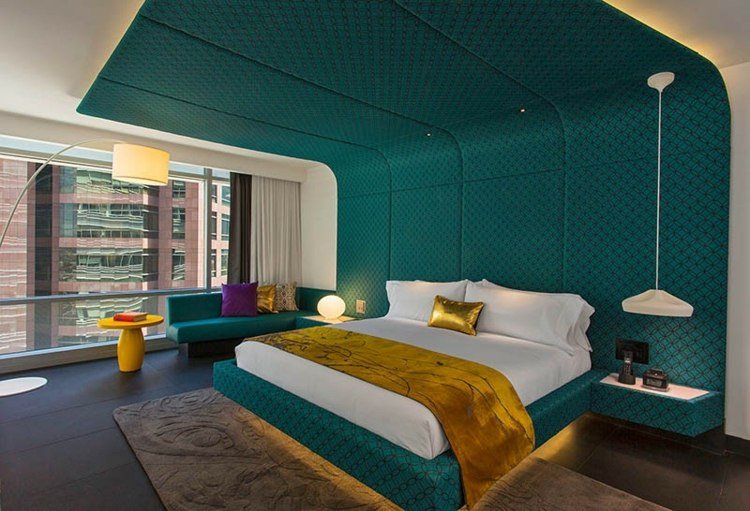inredningsarkitekt och designidéer sänggavel turkos filt säng modern stil