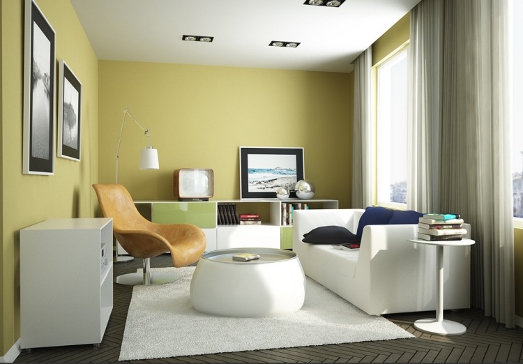 Vardagsrum-vardags-idéer-starka färger-vägg-färg-senap-gul-möbler-vit-fåtölj-läder-senap-gul-gardiner-foton