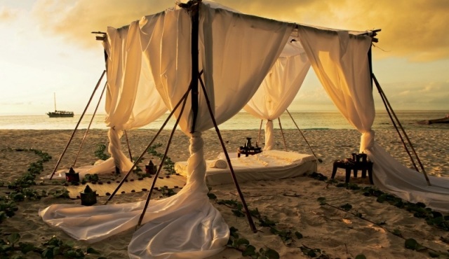 Metallpergola-sky gardiner-romantisk sandstrand Seychellerna