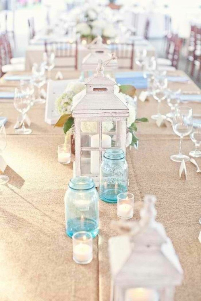 Idéer-bord-design-vit-bröllop-på-stranden-lyktor-gjorda av trä