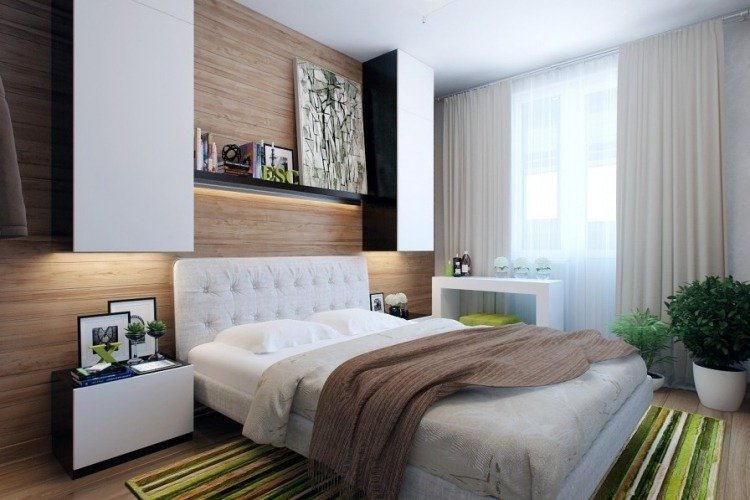 litet sovrum modern-trä-väggbeklädnad-led-remsor-gröna-växter-matta