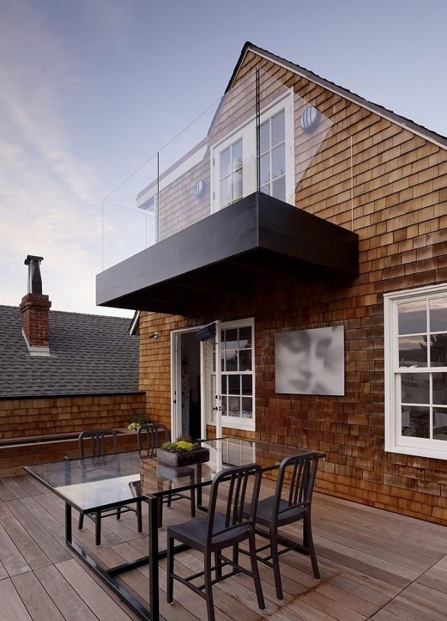 terrass-modern-designad-hall-golv-glas-matbord-svart-stolar