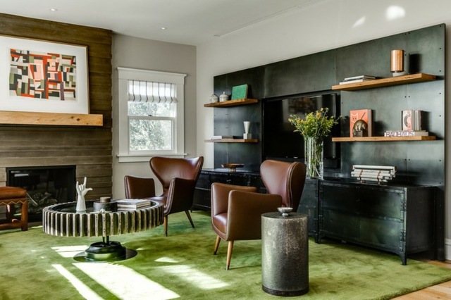 Träfärg svartgrön matta lädermöbler eklektisk inredning