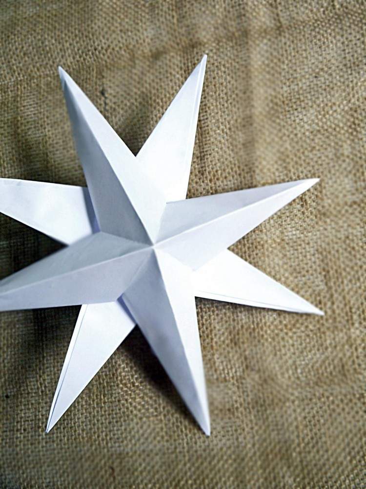 Jul-stjärnor-pyssel-instruktioner-lim-två-stjärnor-tillsammans