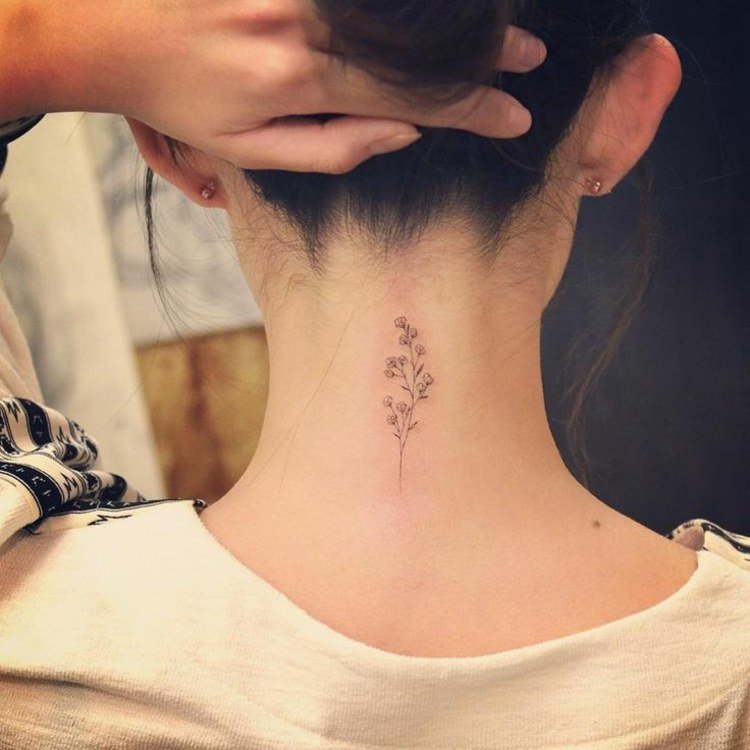 subtil-tatuering-idéer-kvinnor-hals-känslig-blomma-feminin