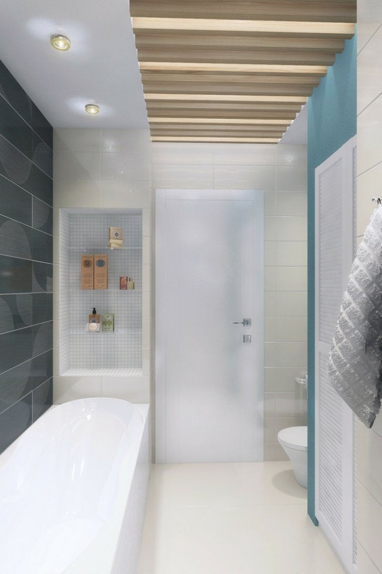 idéer för små badrum ljusblått svart kakelbadkar