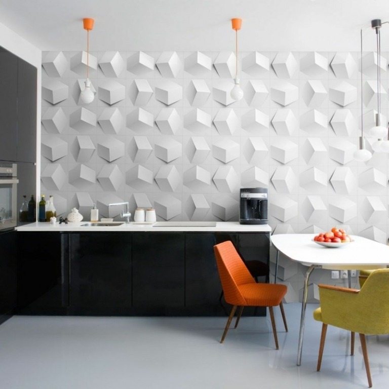 väggpaneler kök 3d effekt kub svart möblering stolar orange gul