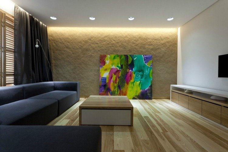 Väggbelysning-idéer-vardagsrum-indirekt-sandsten-vägg-trägolv