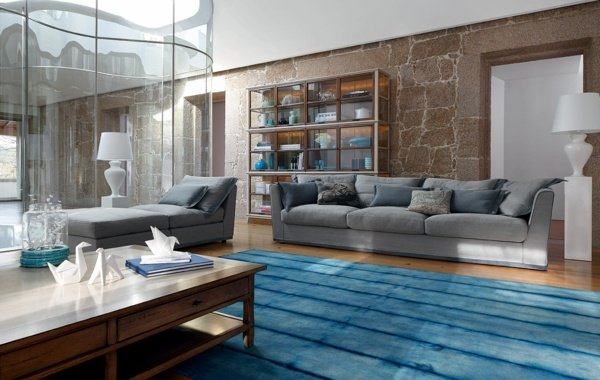 Vardagsrumsdesignidéer natursten vägggrå soffa