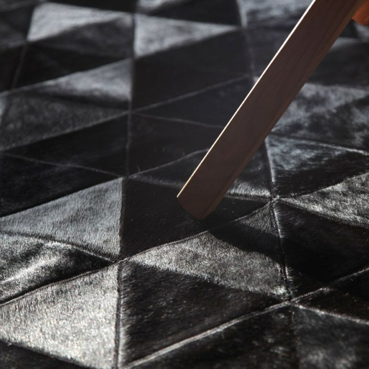 matta lapptäcke trianglar mönster kohud grå glans