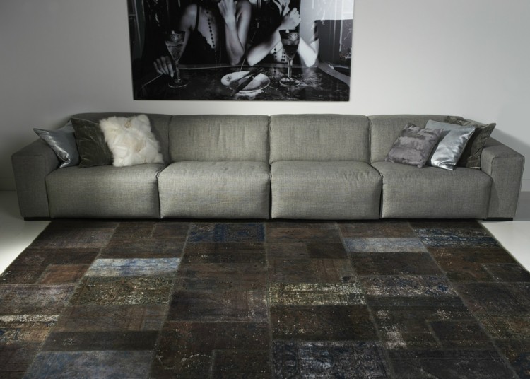 lapptäcke minimalistisk inredning grå golvdesign