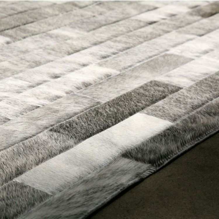 lapptäcke matta nötskinn grå ränder ser modern ut