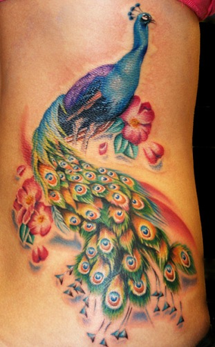 Peacock in Disguise Girls Tattoo