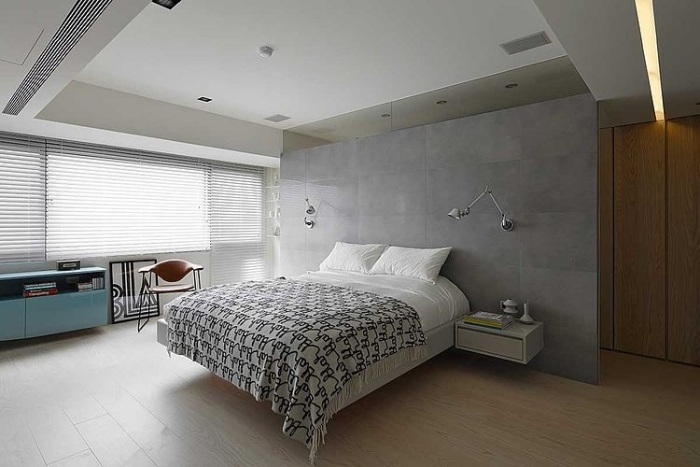 sovrum-puristisk-design-språk-flytande-säng-vägg-färg-grå-laminat-golv