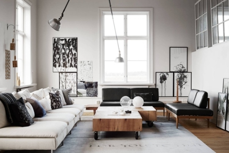 möbleringsidéer-vardagsrum-svart-vitt-loft-soffor-läder-trä-soffbord-lampor-bilder-moderna-kusnt-tryck-moderna-gitterfönster