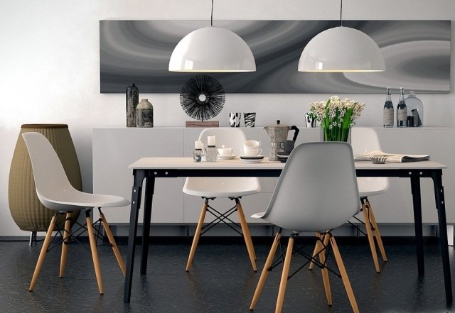 Naturtoner-matbord-skandinaviska-interiör-hängande lampor-väggmålning-abstrakt