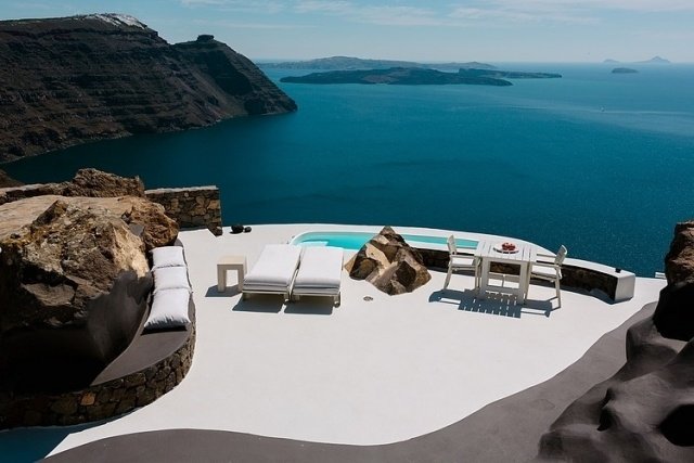 terrass grekland vit sten pool havsutsikt pool