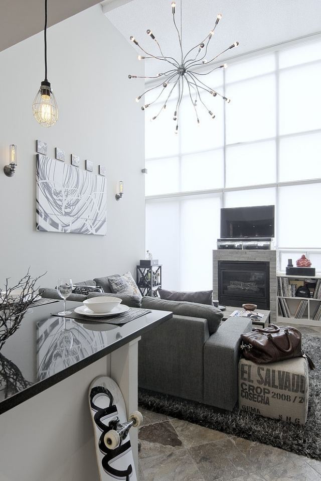 modernt-vardagsrum-grå-vitt-stål-hängande-lampor