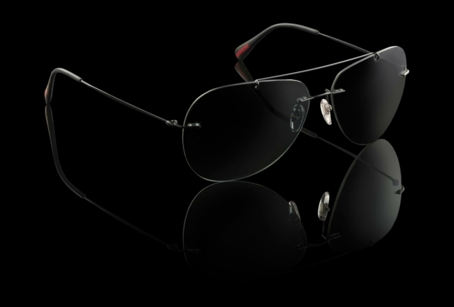 Solglasögon i aluminium med svarta linser