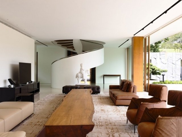 vardagsrum-lyx-hus-brun-sittplatser-soffbord-äkta trä
