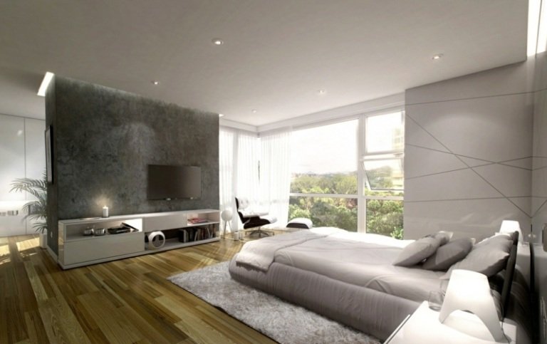 modernt sovrum betong accent vägg skiljevägg lowboard parkett